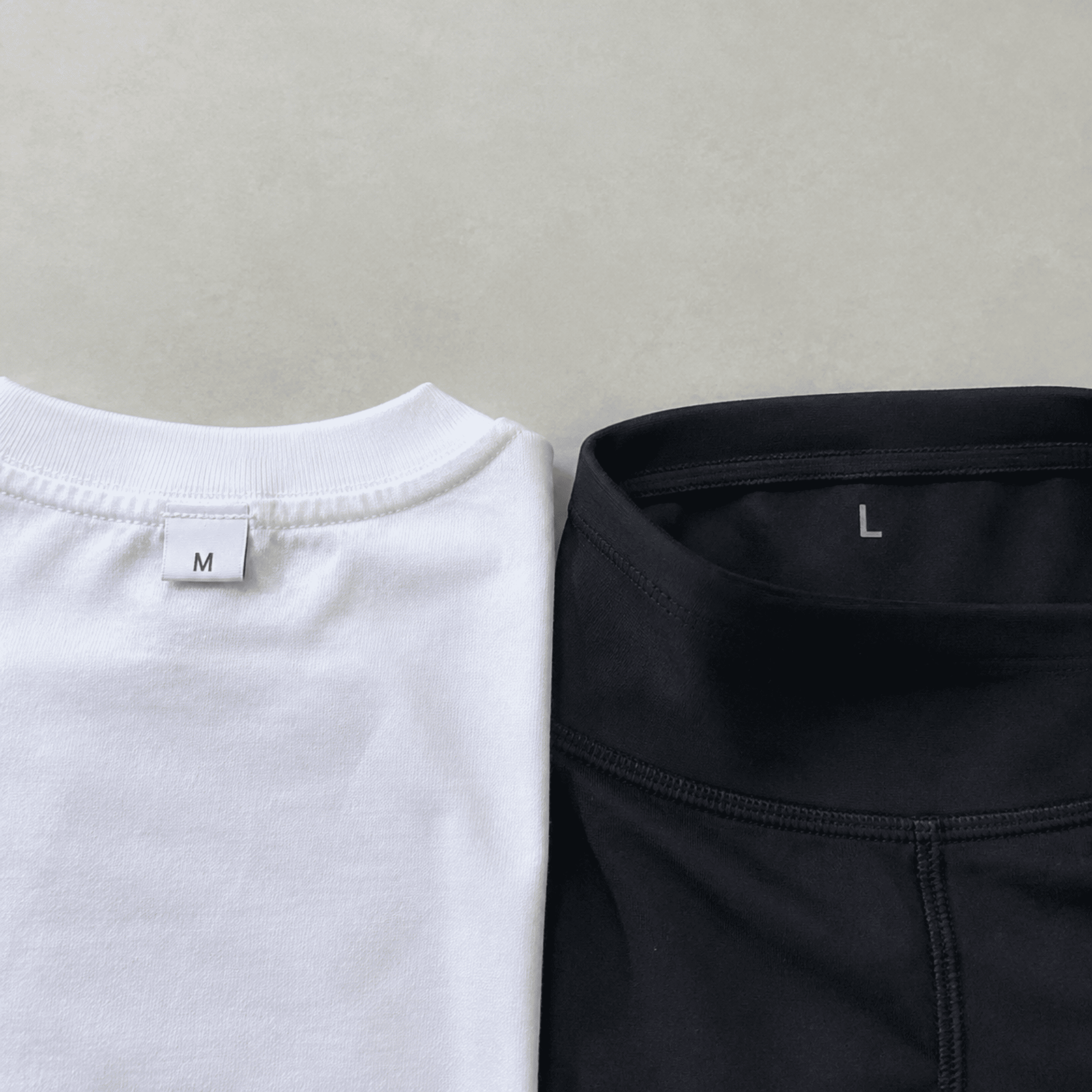 Fashion vs activewear size label comparison woven size labels versus heat transfer size labels comparison