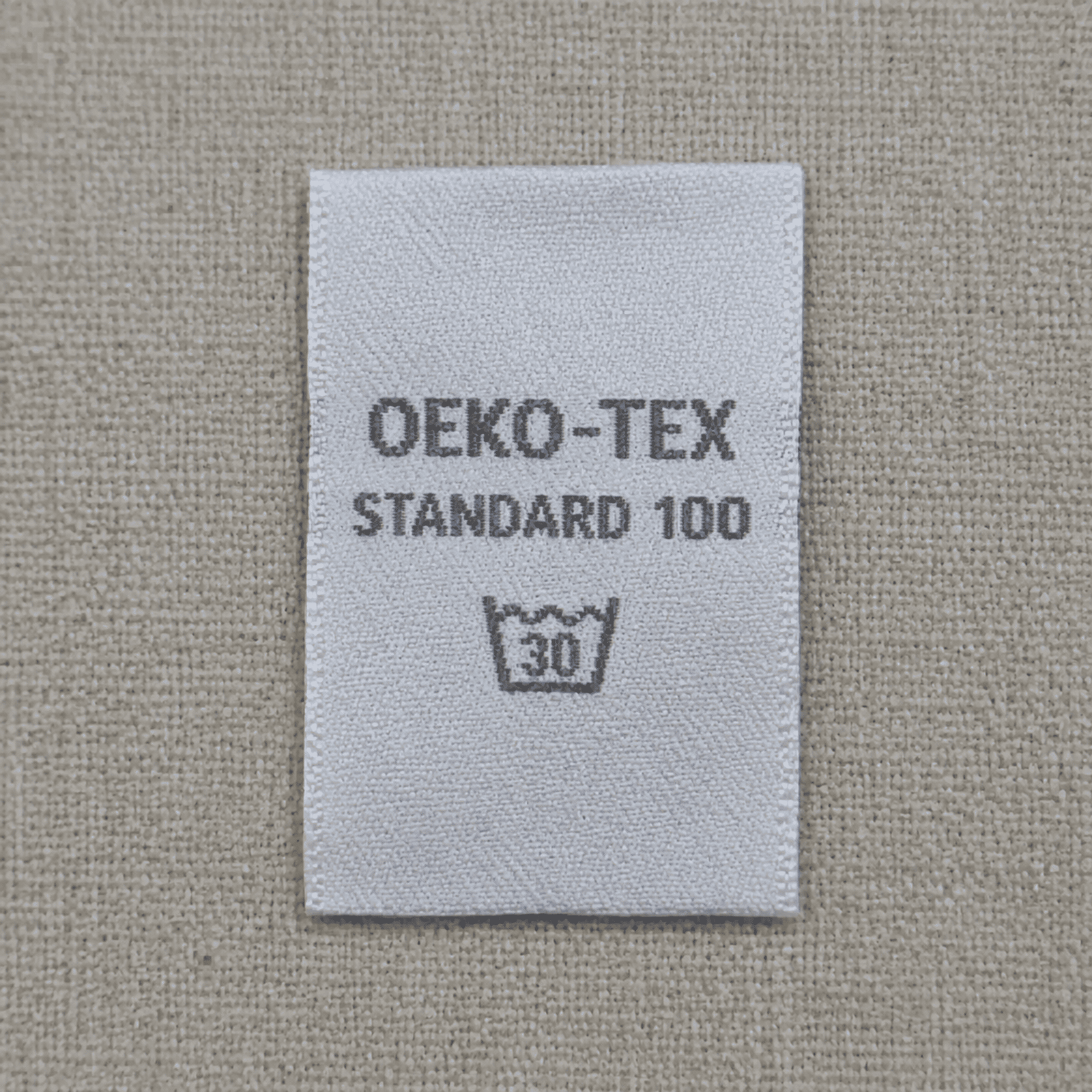 OEKO-TEX certified garment label materials overview OEKO-TEX certified garment label materials including woven labels and leather patches
