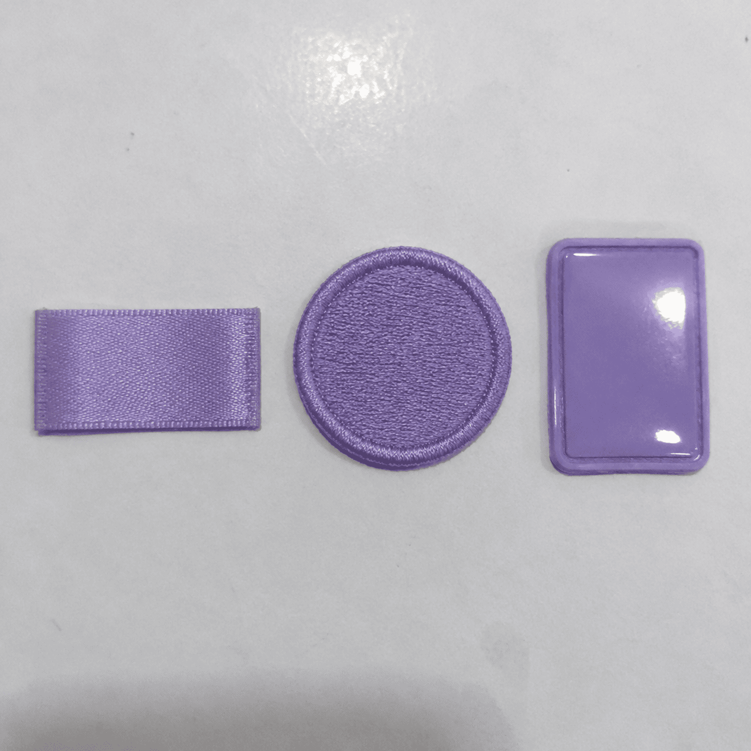 Color gamut variation across woven labels embroidery patches and PVC trims trim substrate color gamut differences for 2026 textile color trends